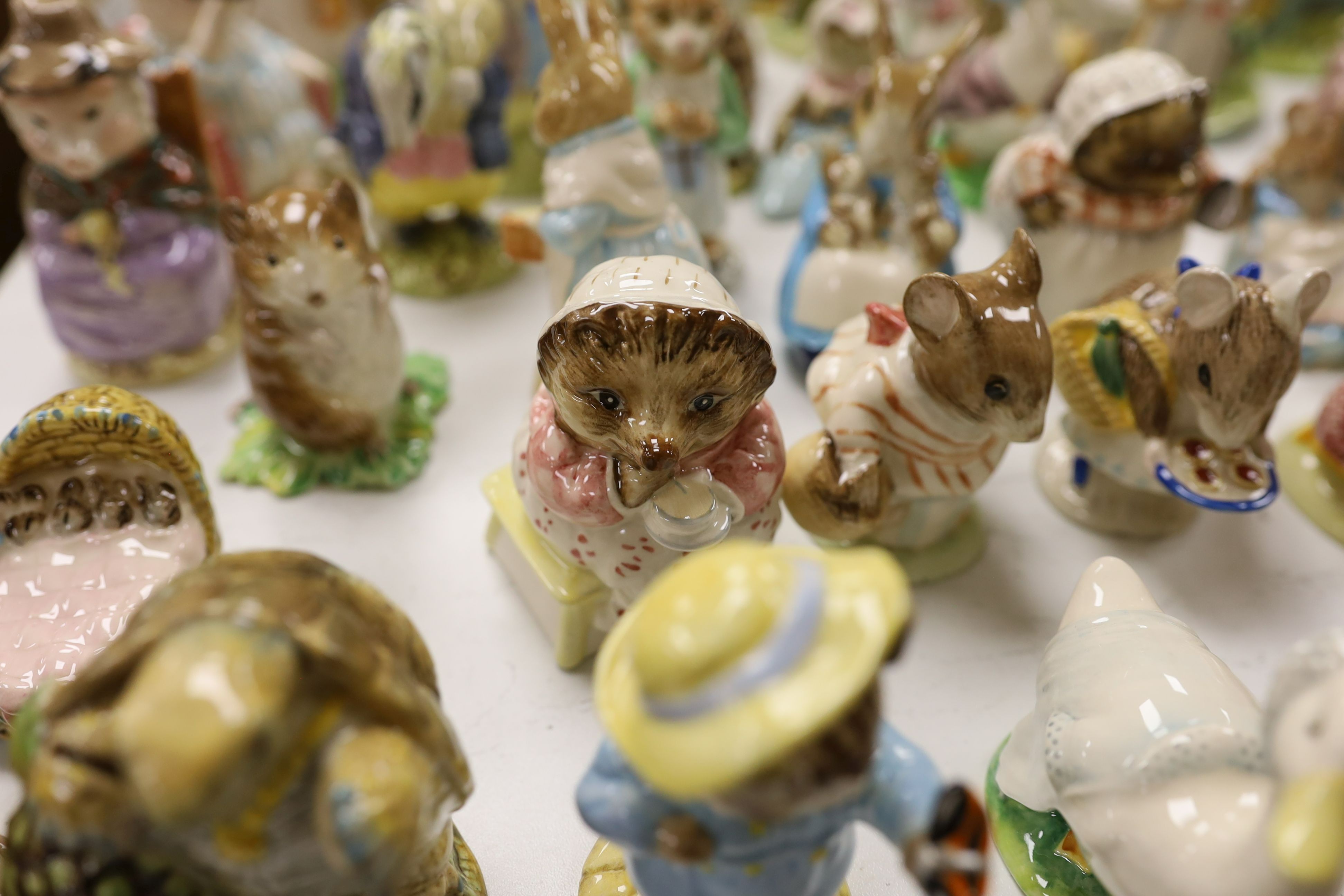 A large collection of various Beswick Beatrix Potter figures, money boxes etc.